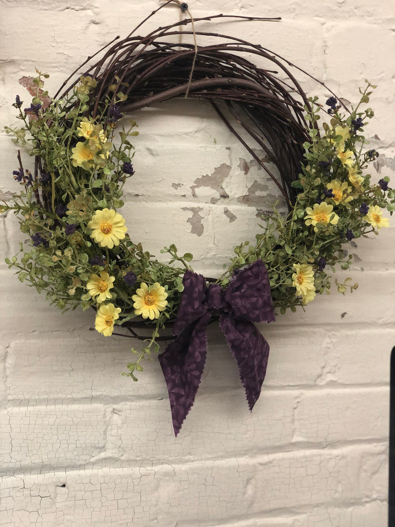 12" Grapevine Twig Wreath With Purple and Yellow Flowers